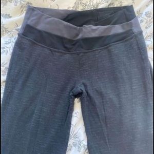 Grey Lululemon full length pants. Grey and black waistband.